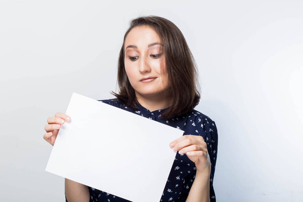 young woman holding sign business board, blank over white background, - Fotografie, Obrázek