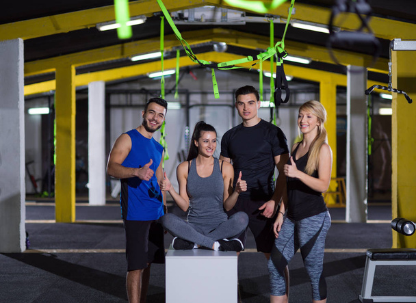 portrait of athletes working out  jumping on fit box - Fotoğraf, Görsel