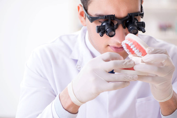 Young dentist working in the dentistry hospital - Photo, Image