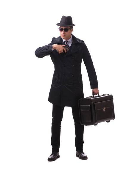 Чоловік шпигун з пістолетом ізольований на білому тлі
 - Фото, зображення
