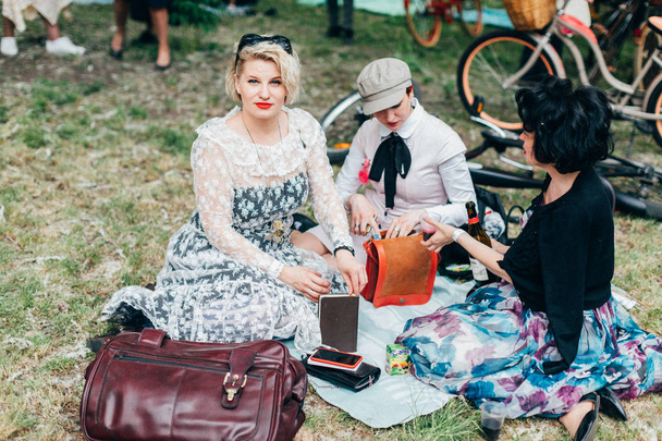 Retro cruise 2018, Ukraine KIEV, UKRAINE - MAY 13: people in vintage clothing participating in bicycle Retro cruise on MAY 13, 2018 in Kiev, Ukraine - Photo, Image