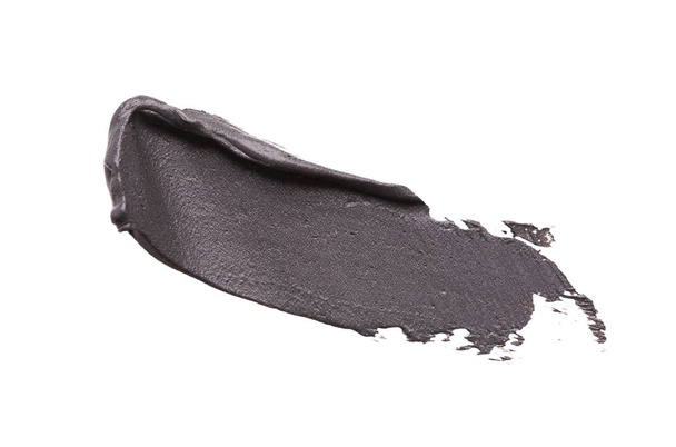 Маска из черной глины на белом изолированном фоне
 - Фото, изображение