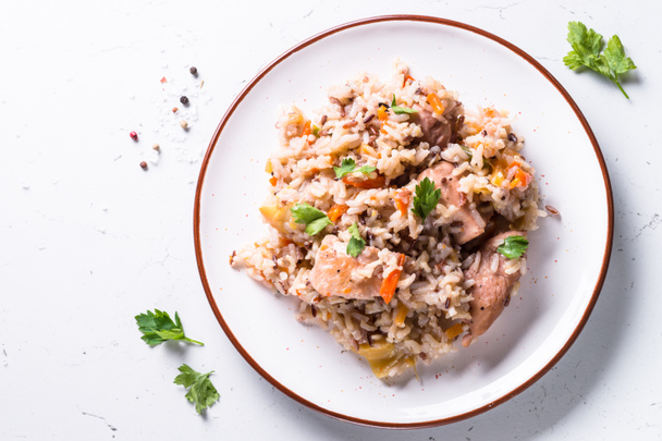 Pilaf with turkey meat and brown rice. - Photo, Image