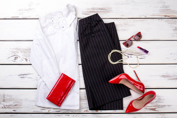 Flat lay female clothes and accessories. - Photo, Image