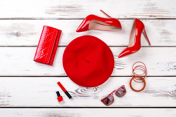 Collage of female red fashion accessories. - 写真・画像