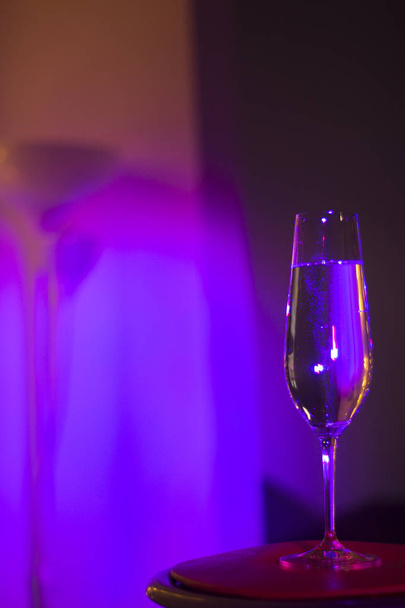 Champagne glass in disco party bar - Photo, Image