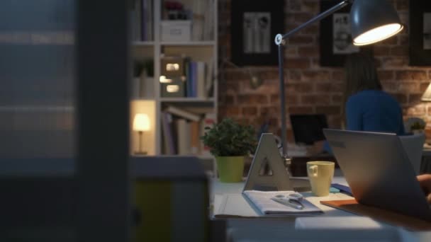 Efficient office worker typing with his laptop - Felvétel, videó