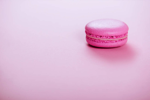 pink macaroons on pink background. - Fotó, kép