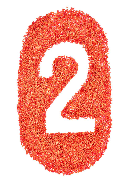 Número 2 sobre arena naranja
 - Foto, imagen