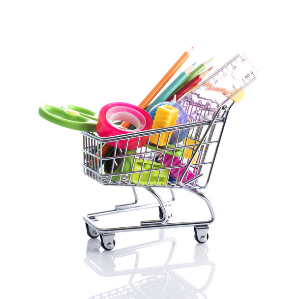 Stationery accessories in a shopping cart - Foto, immagini