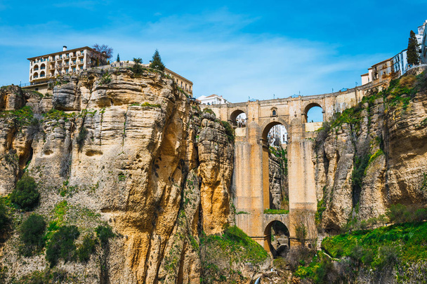 the famous stone bridge over the gorge of tajo in Ronda, Andalusia, Spain - Photo, Image