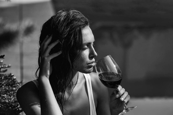 sexy pretty girl drinking red wine - 写真・画像