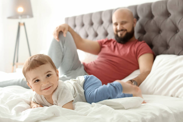 Dad and his little son spending time together at home - Photo, Image