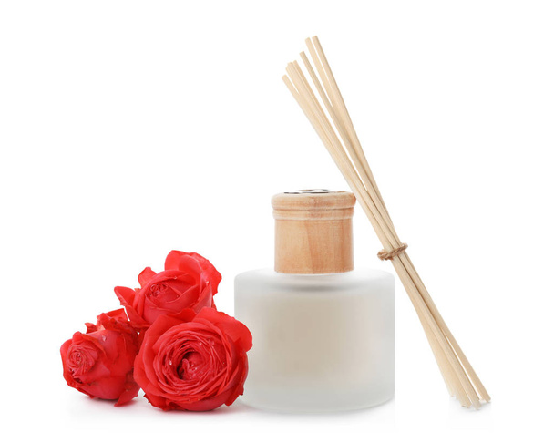 Aromatic reed freshener and roses on white background - Foto, immagini