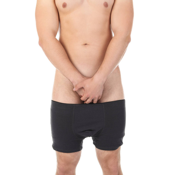 Young man with urological problems on white background - Φωτογραφία, εικόνα