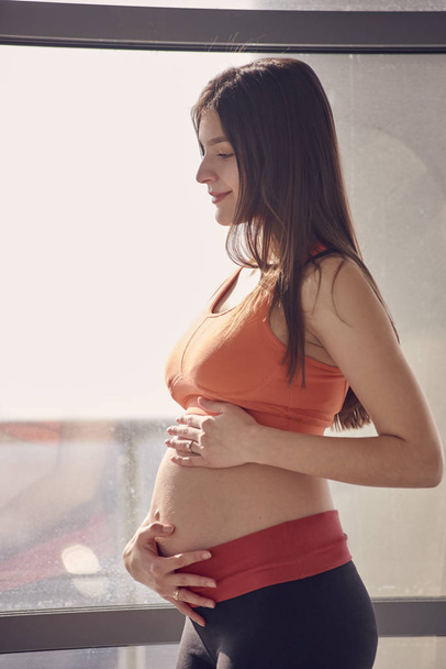 sunlight fitness Pregnant woman - Foto, afbeelding
