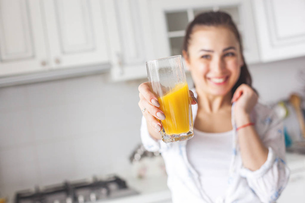 Close up portrait of young attractive woman drinking fresh juice - Photo, Image