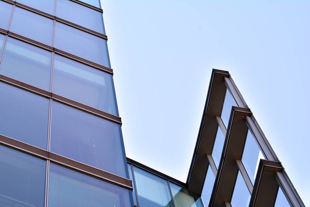 Urban abstract background, detail of modern glass facade, office business building. - Photo, Image