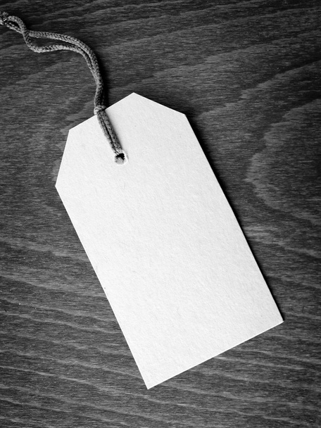 Blank tag on wooden background - Photo, image