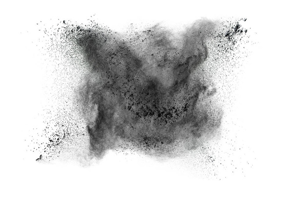 Absztrakt fehér alapon fekete por splatted, fekete por robbanó mozgás rögzítése. - Fotó, kép