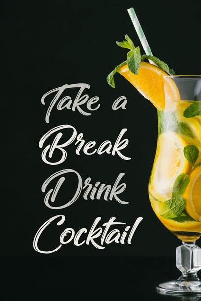 close up view of summer fresh cocktail with mint, lemon and orange pieces, take a break drink cocktail lettering isolated on black - Fotografie, Obrázek