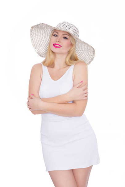 Beautiful young blond woman in a hat. Studio. Isolate. Concept - summer mood - Фото, зображення