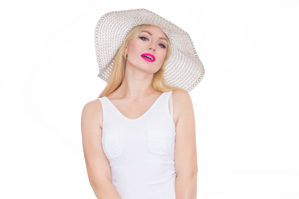 Beautiful young blond woman in a hat. Studio. Isolate. Concept - summer mood - Fotoğraf, Görsel