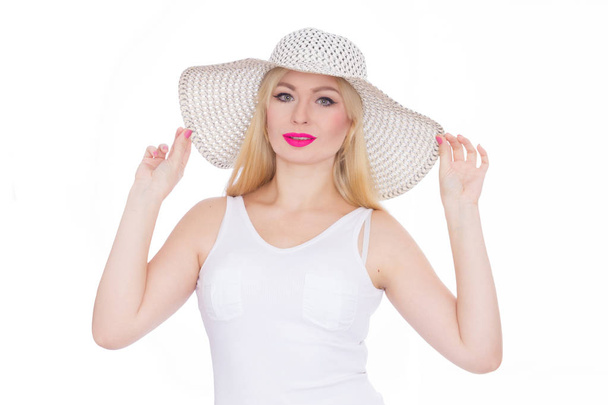 Beautiful young blond woman in a hat. Studio. Isolate. Concept - summer mood - Foto, Imagem