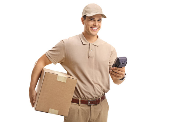Deliver guy with a package and a payment terminal isolated on white background - Photo, image