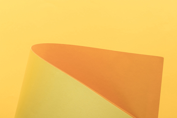 close-up view of bright yellow and orange paper background - Foto, Bild