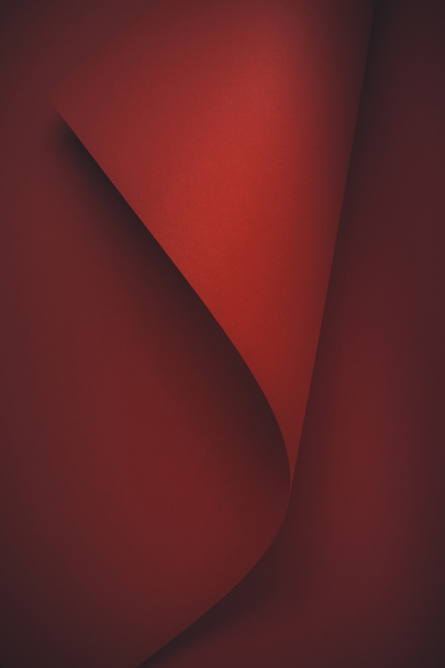 vergrote weergave van donkere rode decoratief papier achtergrond    - Foto, afbeelding