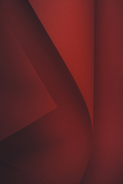 close-up view of dark red abstract paper background  - Φωτογραφία, εικόνα