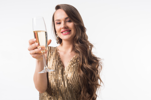 attractive woman showing glass of champagne isolated on white - Fotoğraf, Görsel