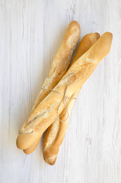 Freshly baked baguettes, from above. Top view.  - Photo, Image
