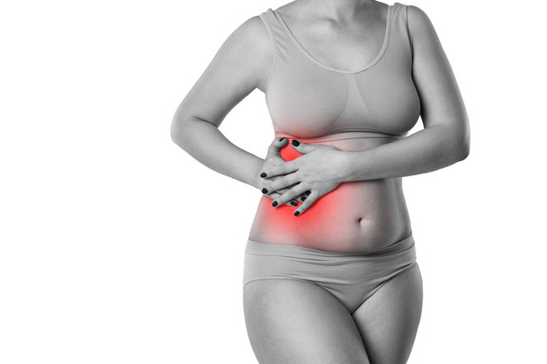 Woman with abdominal pain isolated on white background, ache in right side - 写真・画像