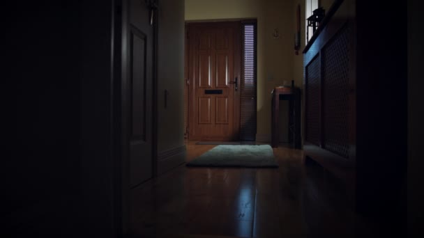 4k Dolly of House Front Door, Child Taking Delivered Parcel - Footage, Video