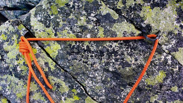 close up voew of a traditional belay stance in granite rock in the southern Swiss Alps - Photo, Image