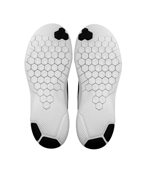 Soles of sports shoes isolated on a white. - Photo, Image