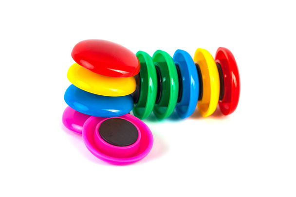 Colorful magnets - holders on a white background. - Photo, Image