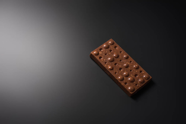 Handmade, bio chocolate isolated on black background - Foto, immagini