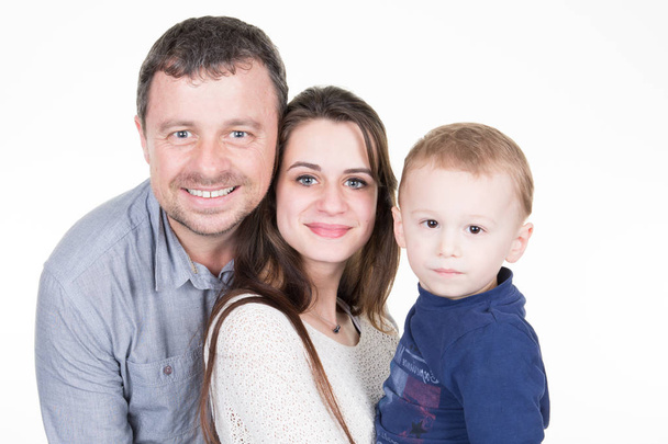 portrait of middle aged father with young mother and child boy son in arms - Photo, Image
