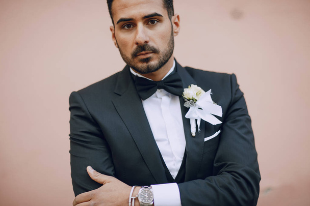stylish groom black suit - Foto, immagini