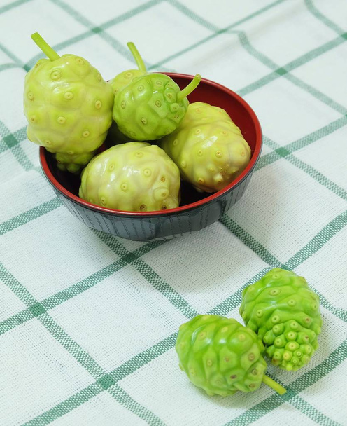 Vegetable and Herb, Fresh Ripe Noni, Morinda Citrifolia, Great Morinda, Indian Mulberry, Beach Mulberry or Cheese Fruits with Polysaccharide, Vitamin A, C and Calcium. The Essential Nutrient for Life. - Photo, Image