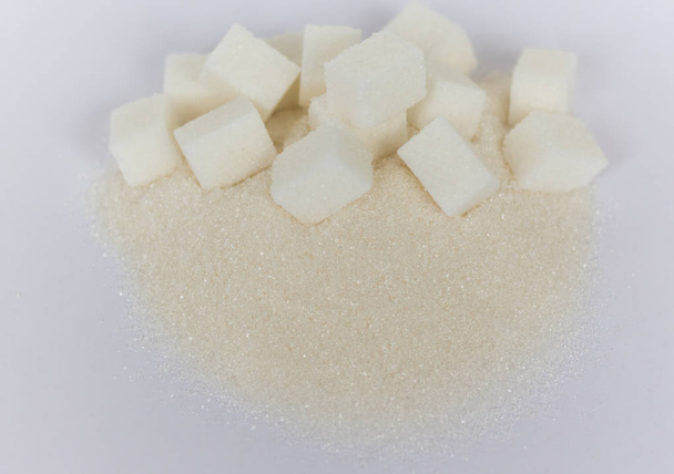 Scivolo di zollette di zucchero
 - Foto, immagini