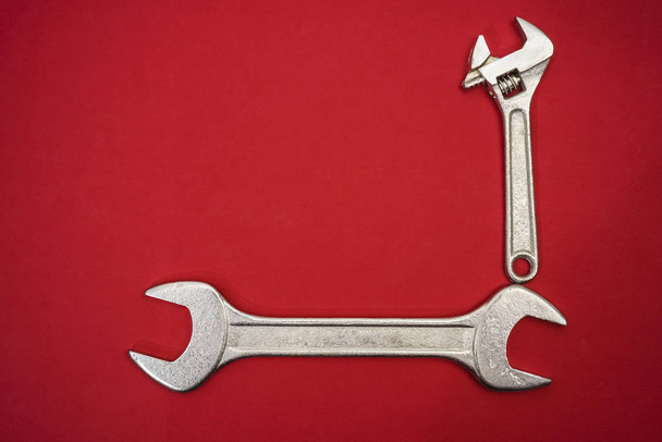  iron wrenches  on red paper background.  - Fotoğraf, Görsel