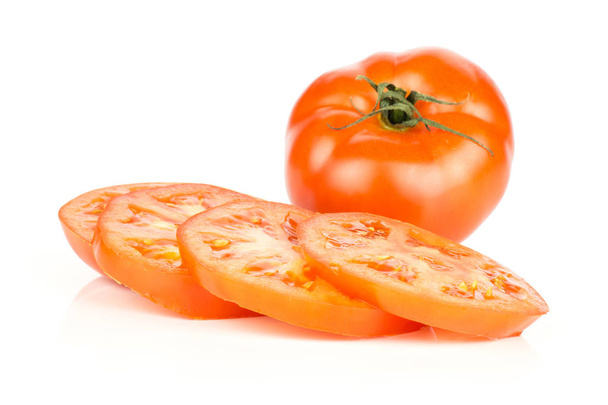 Sliced red tomato isolated on white background one whole with three circle slice - Photo, image