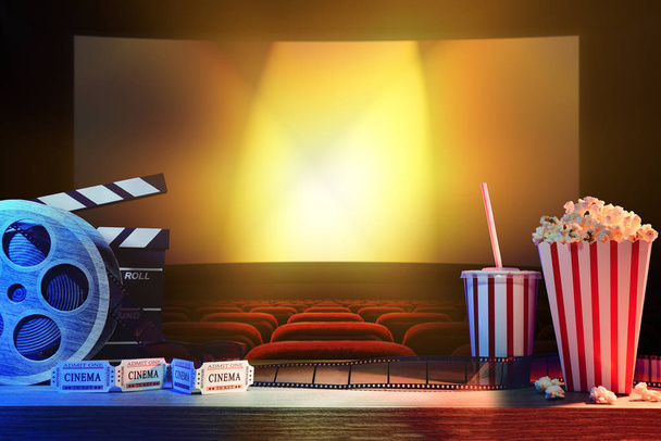 Equipment and elements of cinema on wooden table and background cinema. Concept of watching movies. Horizontal composition. Front view. - Photo, image