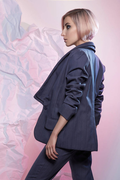 Young business woman in trouser suit.blond bob hair model girl manager - Fotó, kép