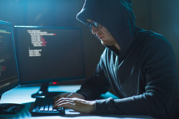 hacker using computer virus for cyber attack - Fotó, kép