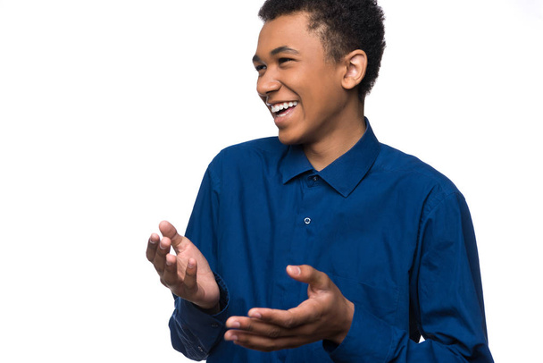 Portrait of cheerful african american teenager - Foto, Imagen